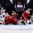 COLOGNE, GERMANY - MAY 15: Denmark's Sebastian Dahm #32 makes the save against Itay's Michele Marchetti #68 while Patrick Russell #60, Phillip Bruggisser #2 and Tommaso Goi #58 look on during preliminary round action at the 2017 IIHF Ice Hockey World Championship. (Photo by Andre Ringuette/HHOF-IIHF Images)

